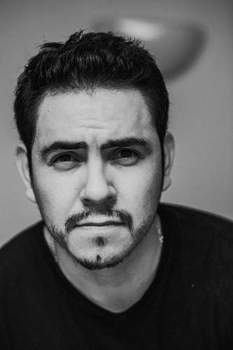 person greyscale photo of man black-and-white