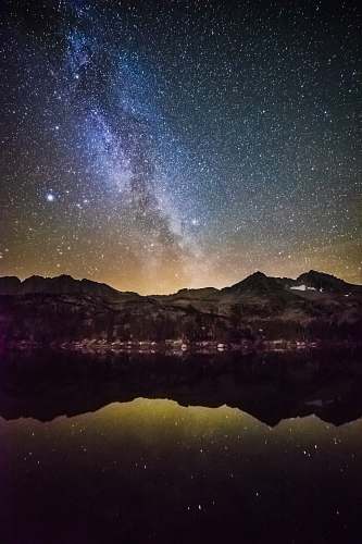 outdoors starry night sky over the mountain by the glassy lake android backgrounds