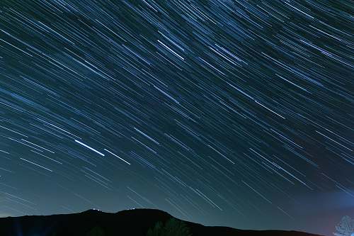 outdoors time lapse photography of stars during night time night