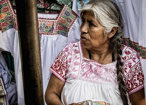 person woman in white and red short-sleeved dress human