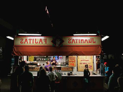 people Juanitas Fajitas store during night time human