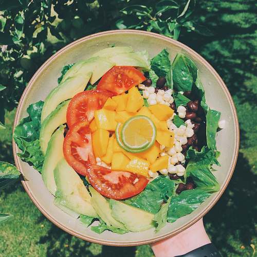dish veggie salad in white and brown ceramic plate meal