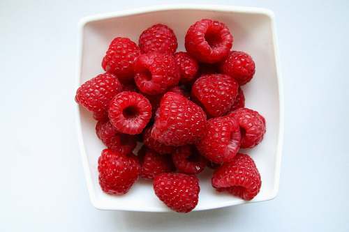 fruit red strawberries on white ceramic bowl plant