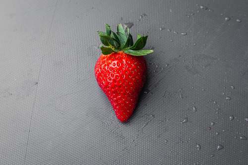 fruit red strawberry on gray textile plant