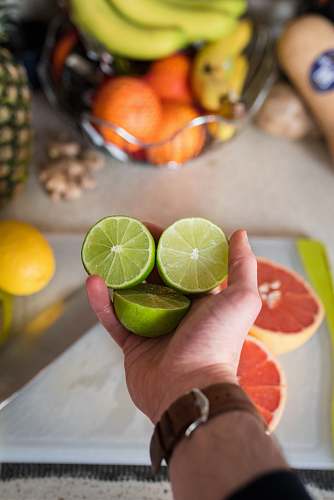 food person holding sliced lemon fruit citrus fruit