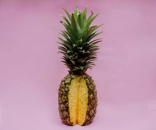 pineapple pineapple fruit on pink surface food