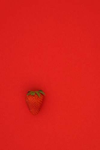strawberry red strawberry fruit on red surface food