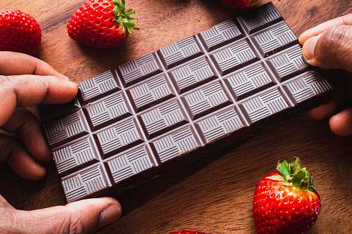 food red strawberry on brown wooden table plant