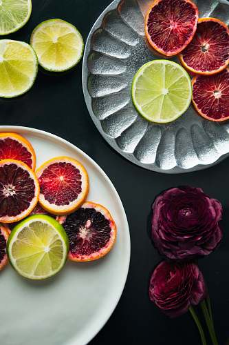 food sliced lemon on white ceramic plate citrus fruit