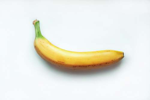 food yellow banana on white surface banana