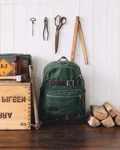 bag green backpack near wall venice