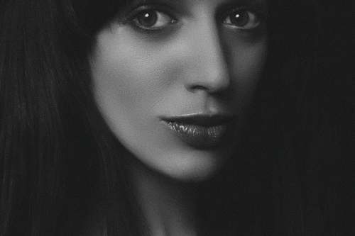 face grayscale photography of woman human