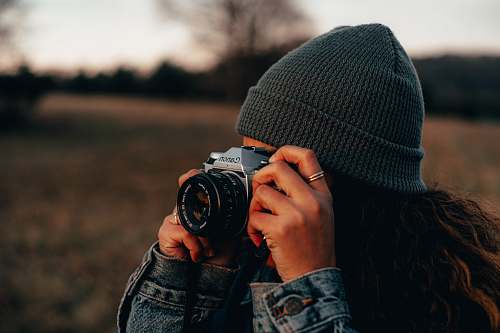 person woman with DSLR camera human