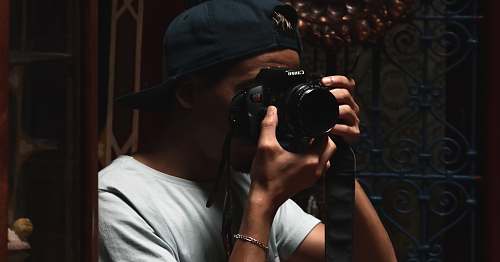 person black DSLR camera camera