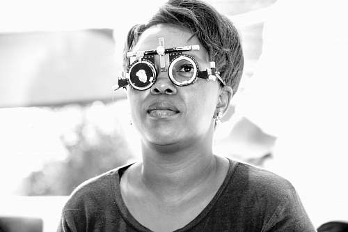 person grayscale photo of woman black-and-white