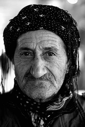 person grayscale photography of man face
