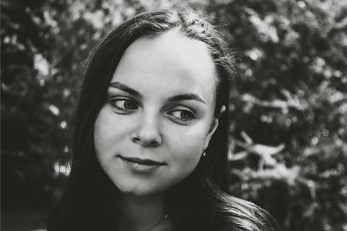 black-and-white grayscale photography of woman smiling face