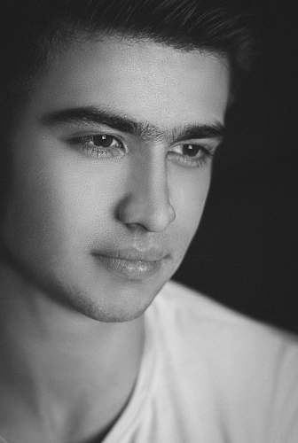 black-and-white greyscale photo of man face