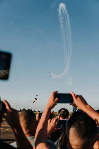 person man capturing airshow face