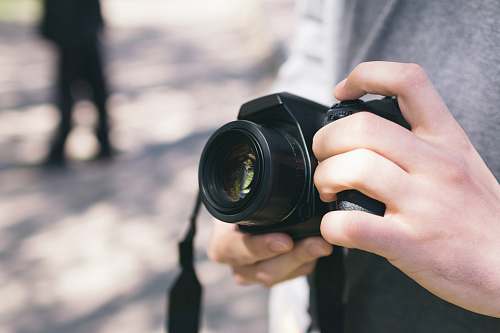 camera person using camera electronics