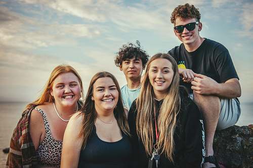 person photography of five people near outdoor during daytime face