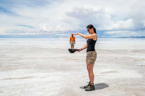 person woman standing on on field clothing