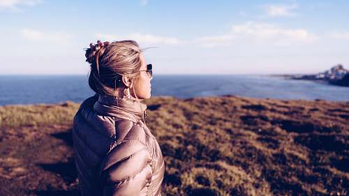 nature woman standing on cliff outdoors