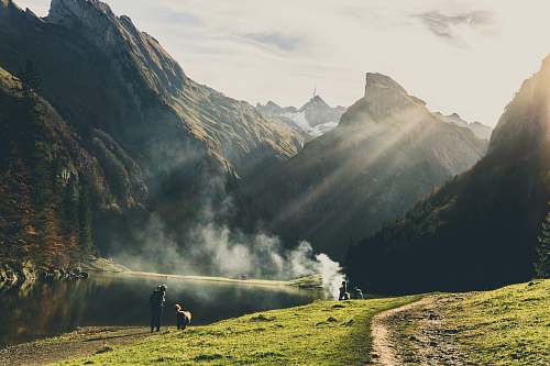 switzerland group of people making smoke during daytime mountain