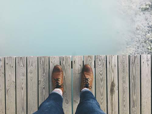 iceland person standing on dock person