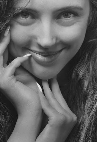 black-and-white grayscale photography of woman smiling face