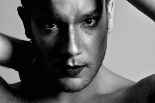 black-and-white man's face grayscale photo face