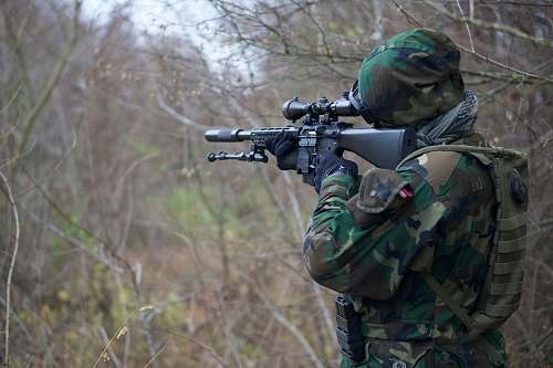 human person holding assault rifle people
