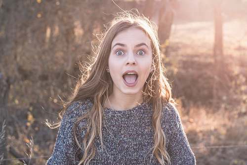 clothing woman standing showing shocking face apparel