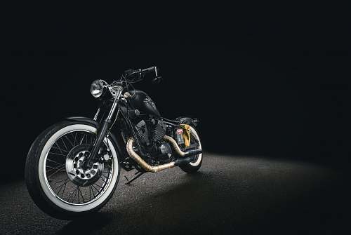 transportation black bone motorcycle on black background motorcycle