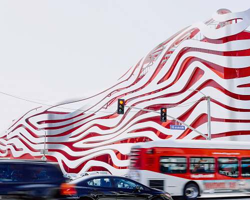 bus red and white building transportation