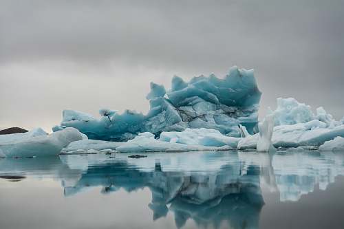ice ice berg on body of water nature