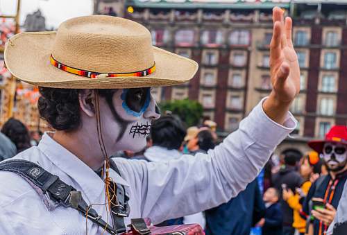 clothing man wearing white dress shirt with sugar skull paint mask apparel