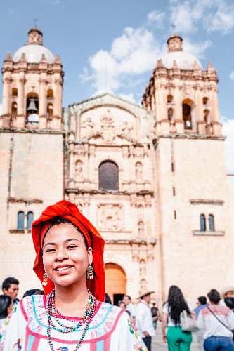 person people in front of cathedral during day clothing
