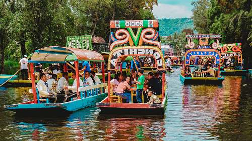person people riding tour boats during daytime transportation