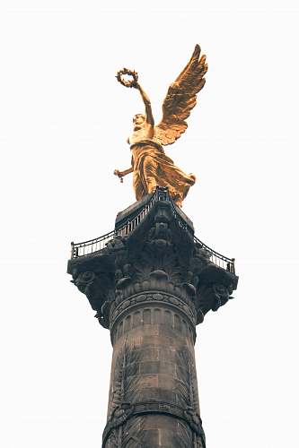 sculpture brass-color statue column