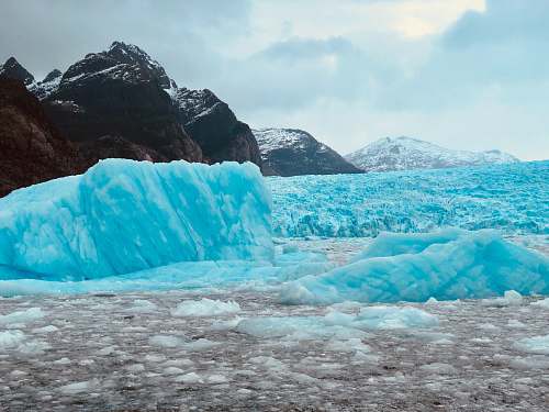 ice icebergs during day glacier