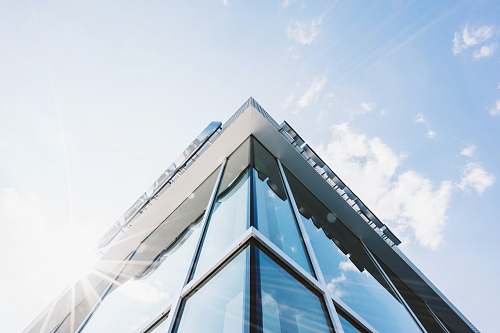architecture glass building wall under clear sky city
