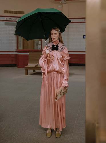 clothing woman in pink dress under green umbrella gown
