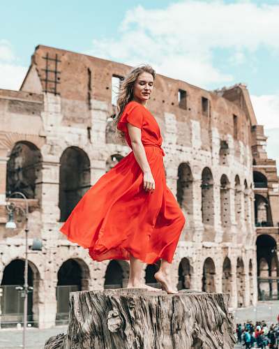 clothing woman standing on stamp during daytime fashion