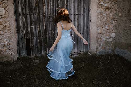 clothing woman wearing blue spaghetti strap dress evening dress