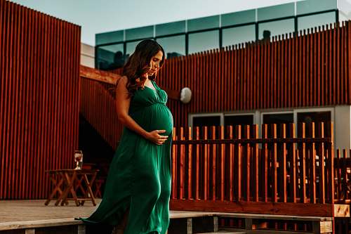 clothing woman wearing blue spaghetti strap maxi dress evening dress