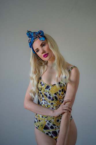 clothing woman wearing multicolored one-piece bikini fashion