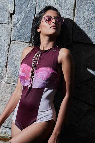 clothing woman wearing one-piece swimsuit wearing sunglasses evening dress