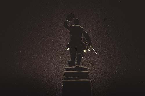 goderich silhouette of statue against black background statue