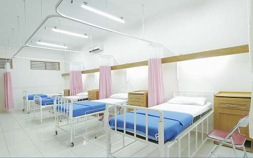 furniture empty hospital bed inside room healthcare
